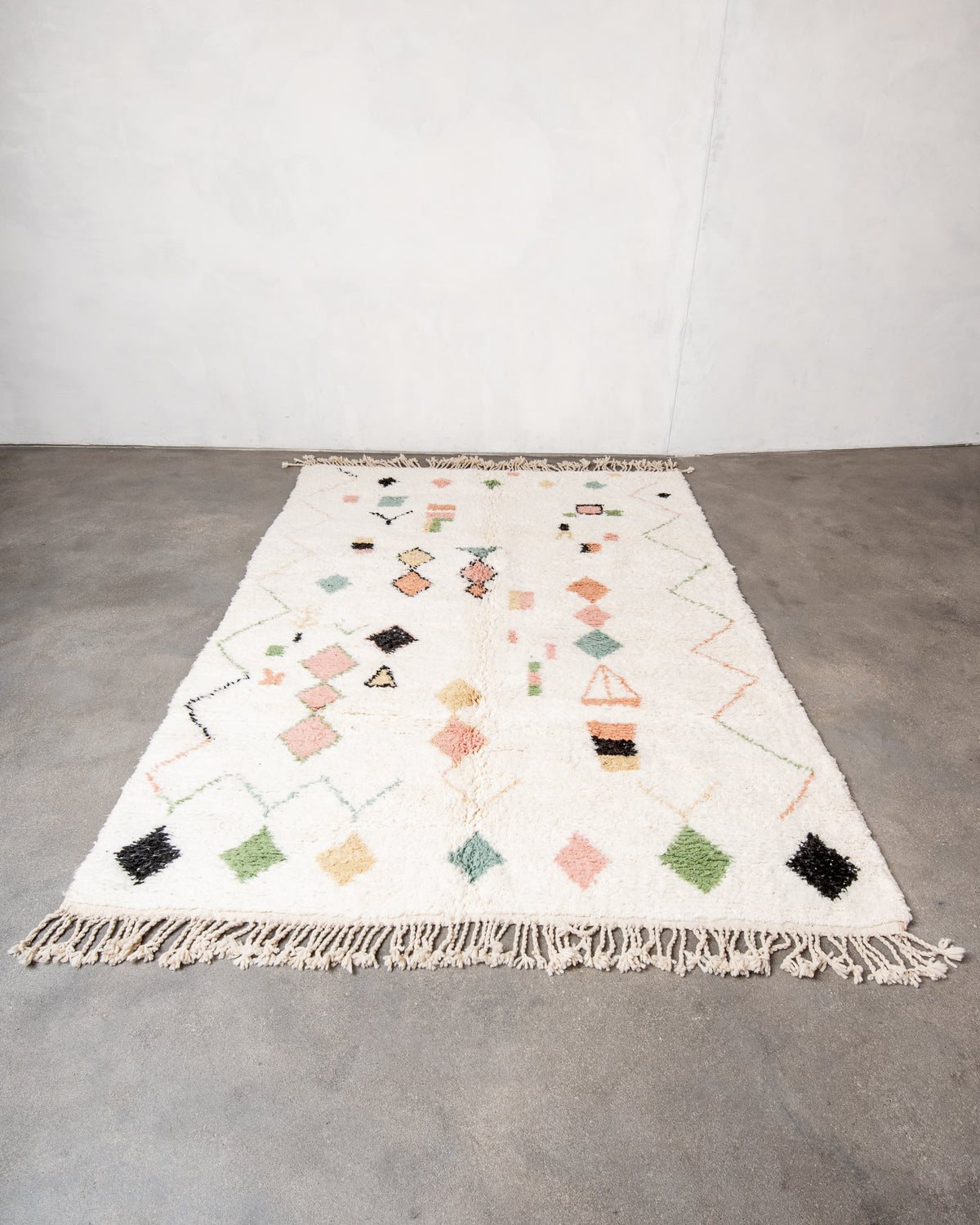Modern, designer, handcrafted Berber runner rug from Morocco. Beniourain carpet with beautiful colours and patterns and fluffy wool texture.
